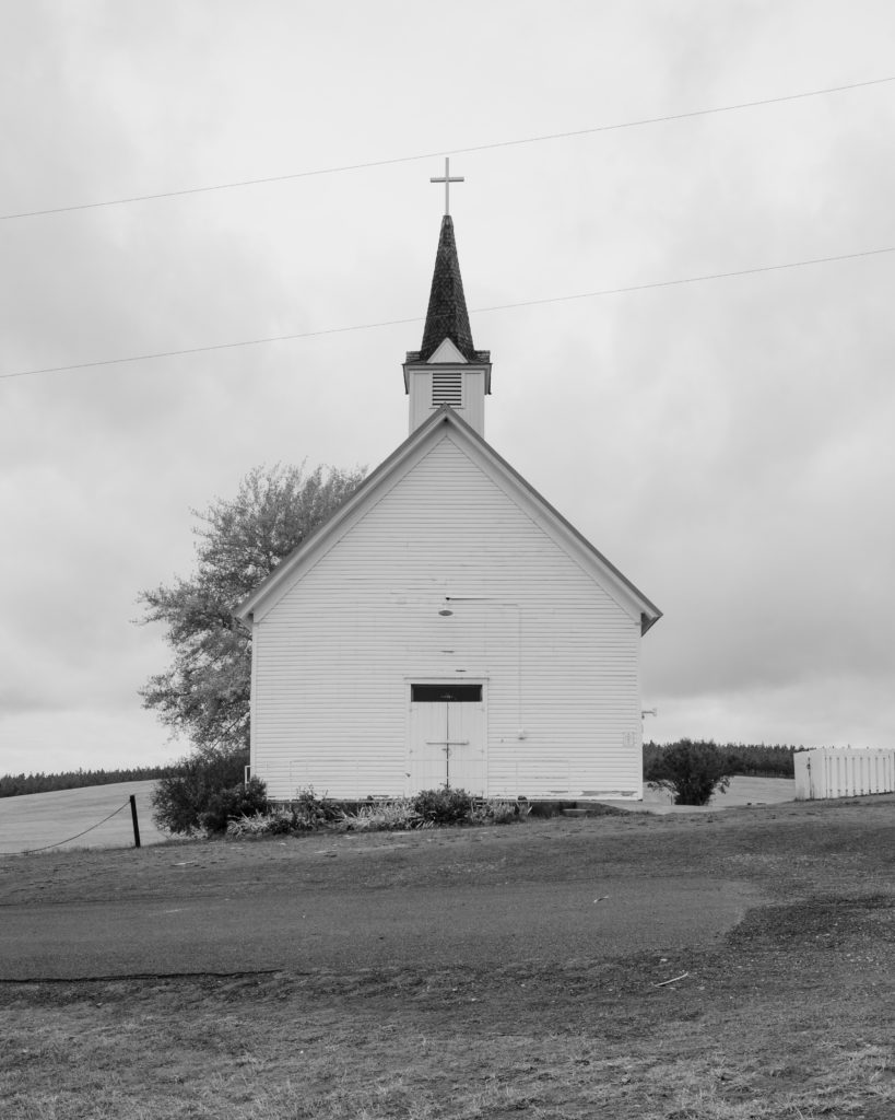 Freeze Idaho Community Church from the front in black and white by Bret Stein