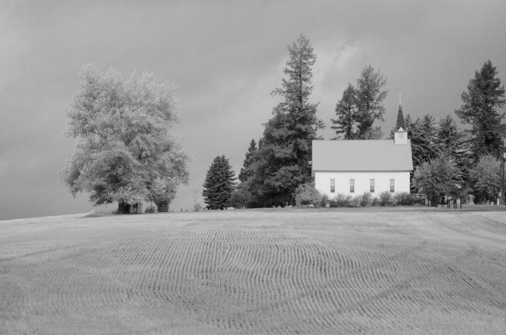 Freeze Idaho Community Church from the side in black and white by Bret Stein